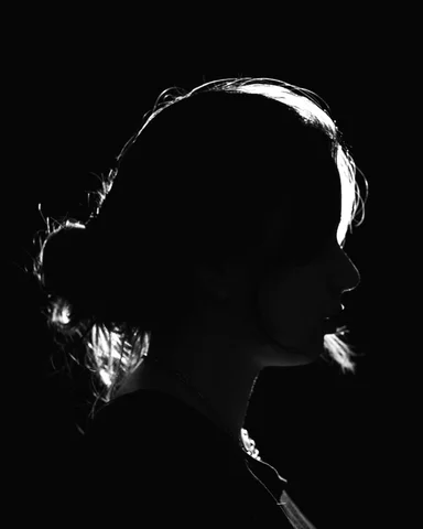 A black and white photo of a woman's profile photo – Free Wallpaper 4k Image on Unsplash