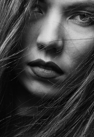 A black and white photo of a woman with long hair photo – Free Woman Image on Unsplash