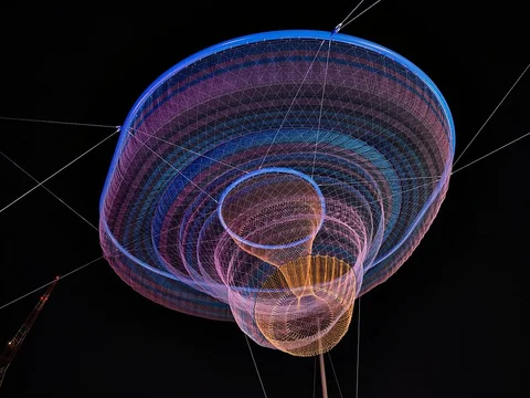 Janet Echelman’s 2009 public-art, illuminated sculpture, “Her Secret is Patience,” in downtown Phoenix’s Civic Space Park.