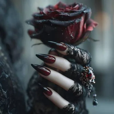 Dark Rose in a Ringed Hand