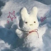 Little Snow Bunny with a Ribbon