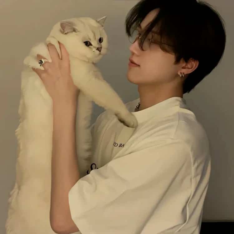 Holding Our Cat Together — Matching Avatars · Right