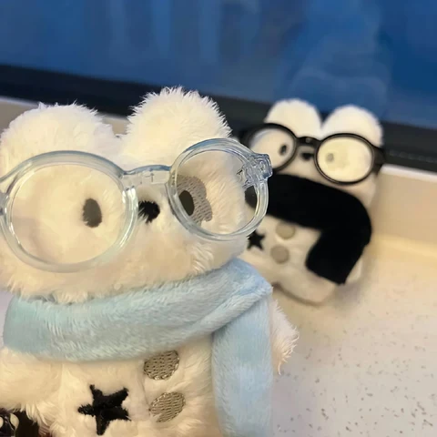 Minions — Black and White Plush Outfits · Left