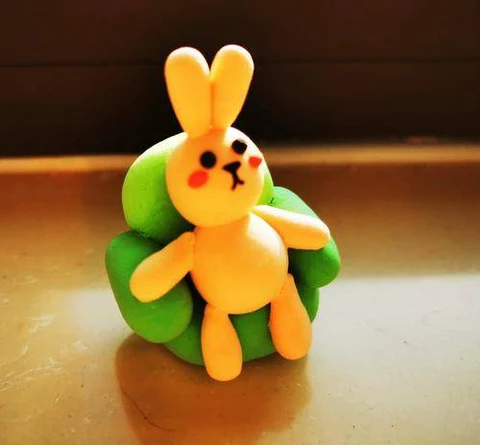 Yellow Clay Bunny with a Carrot · S413